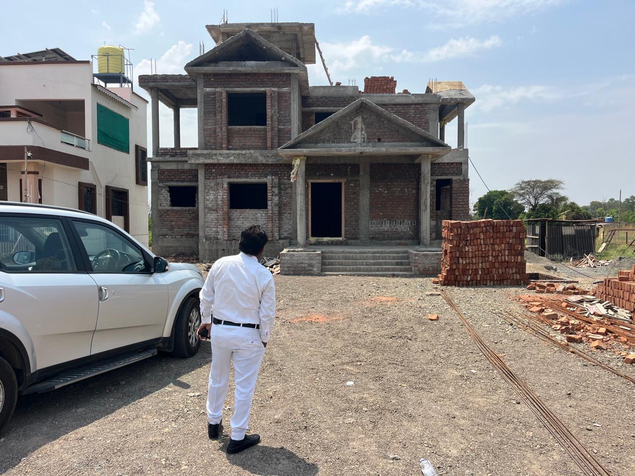 Engineer inspecting a building under construction
